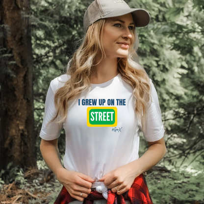Woman wearing a white t-shirt with text in a forest setting